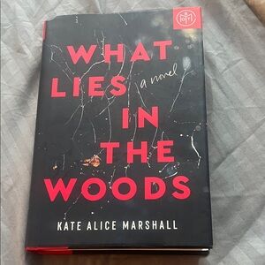 77. What Lies in the Woods Book